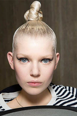 Sleek Top Knot - Buns and Braids - Easy Summer Hairstyles For This Hot Season - Living Style Bits